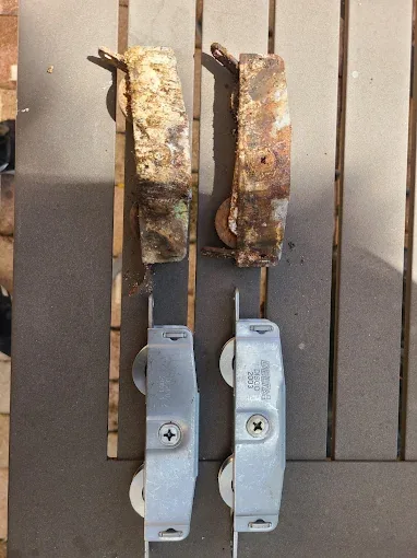 Replacement window rollers prepared on the workbench before repair