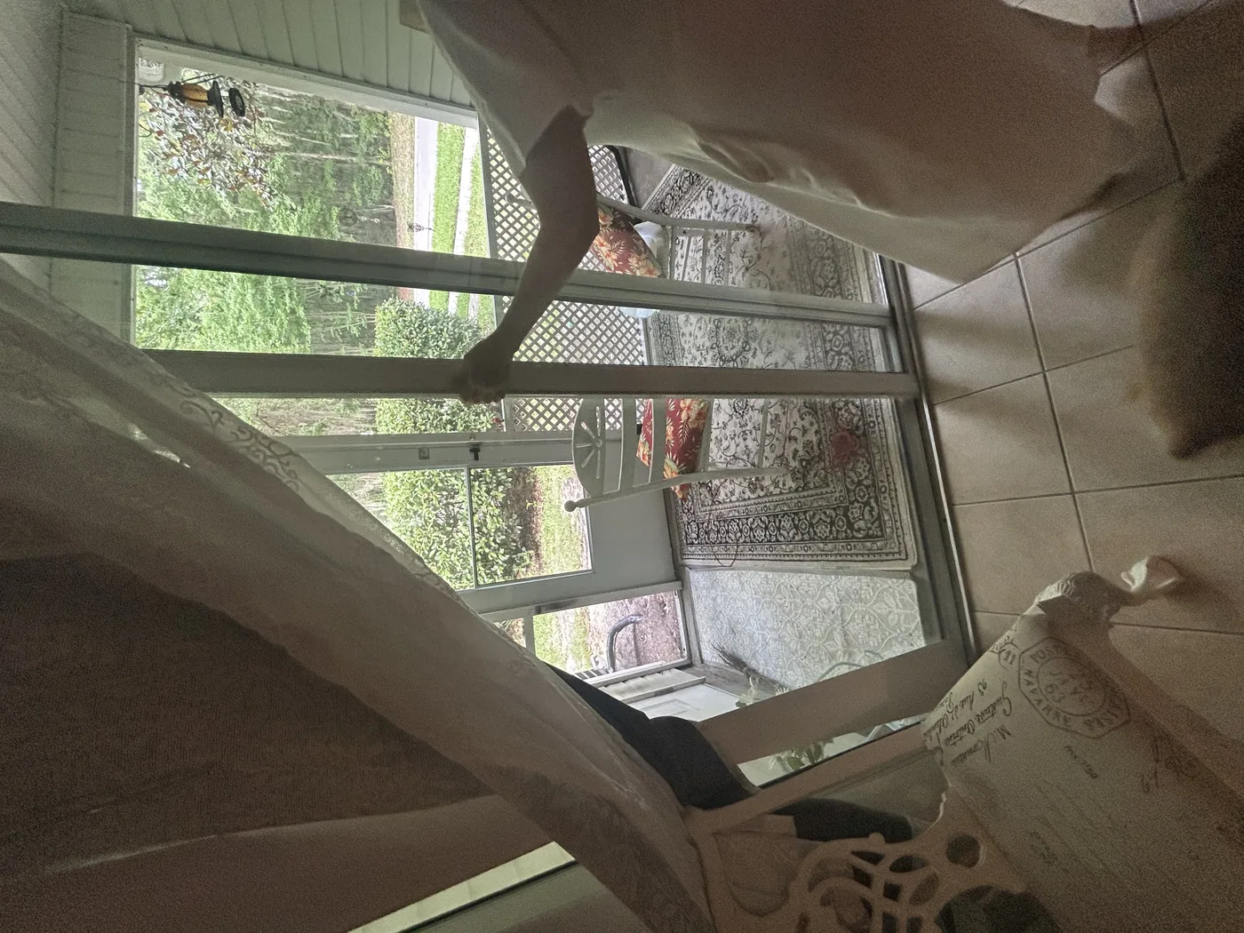 Sliding glass door panel removed after coming off its track